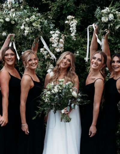 Bridal party Bride and groom in the garden at St Johns House in Lichfield
