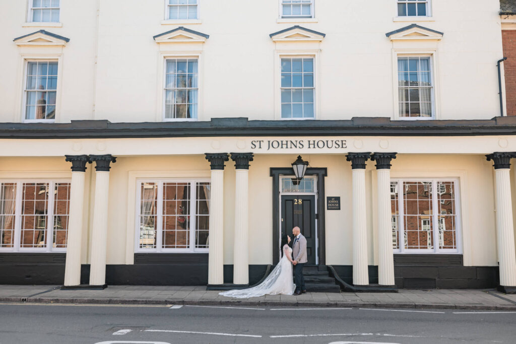 Bride and groom outside St Johns House in Lichfield
