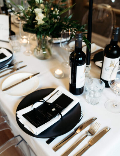 Dark aesthetic wedding table decorations at St Johns House in Lichfield