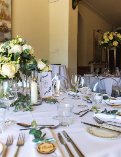 Wedding tables decorated with flowers at St Johns House in Lichfield