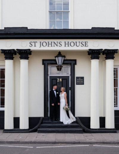 Bride and groom outside St Johns House in Lichfield